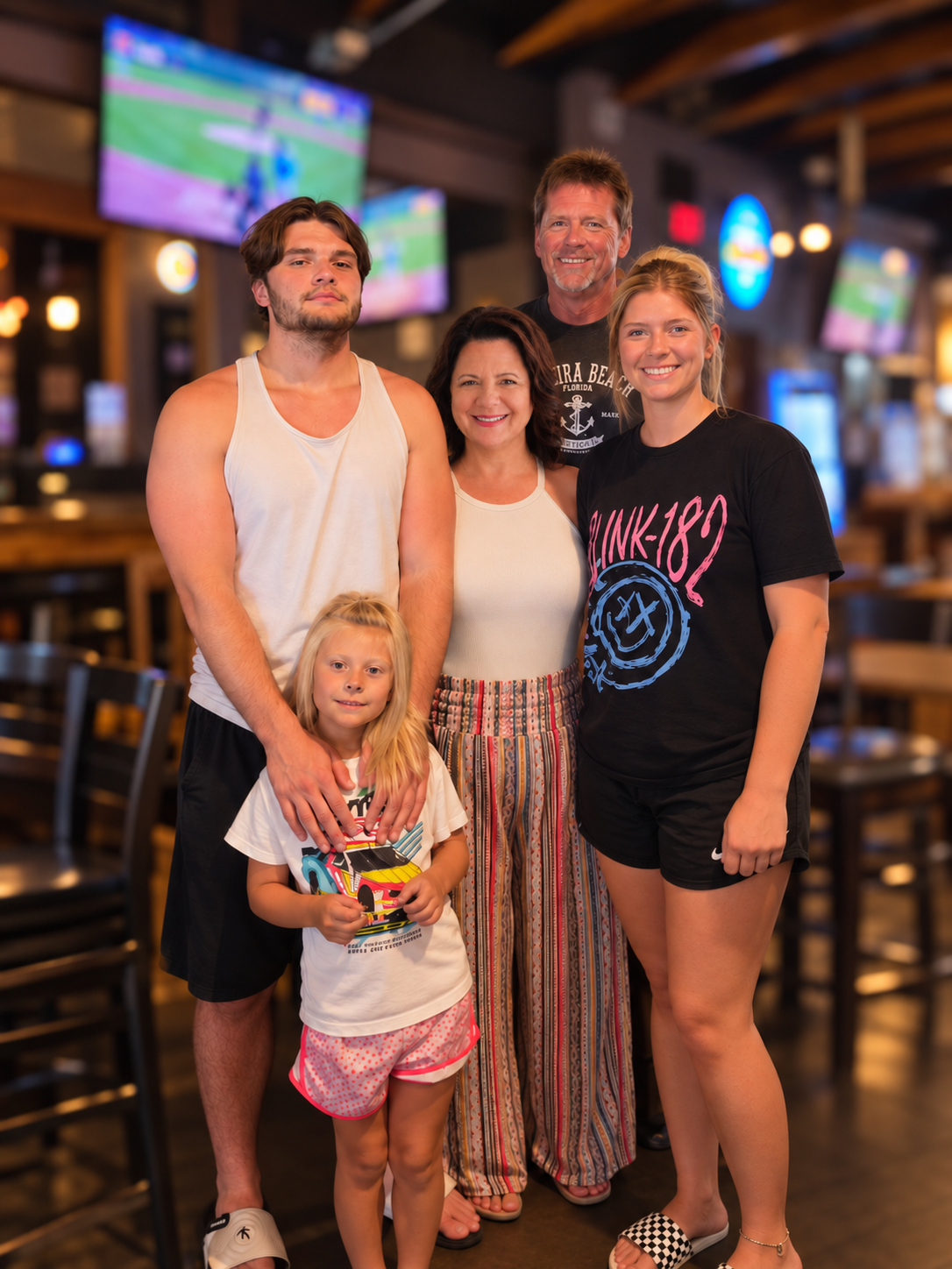 Warm Family Portrait at Sports Bar